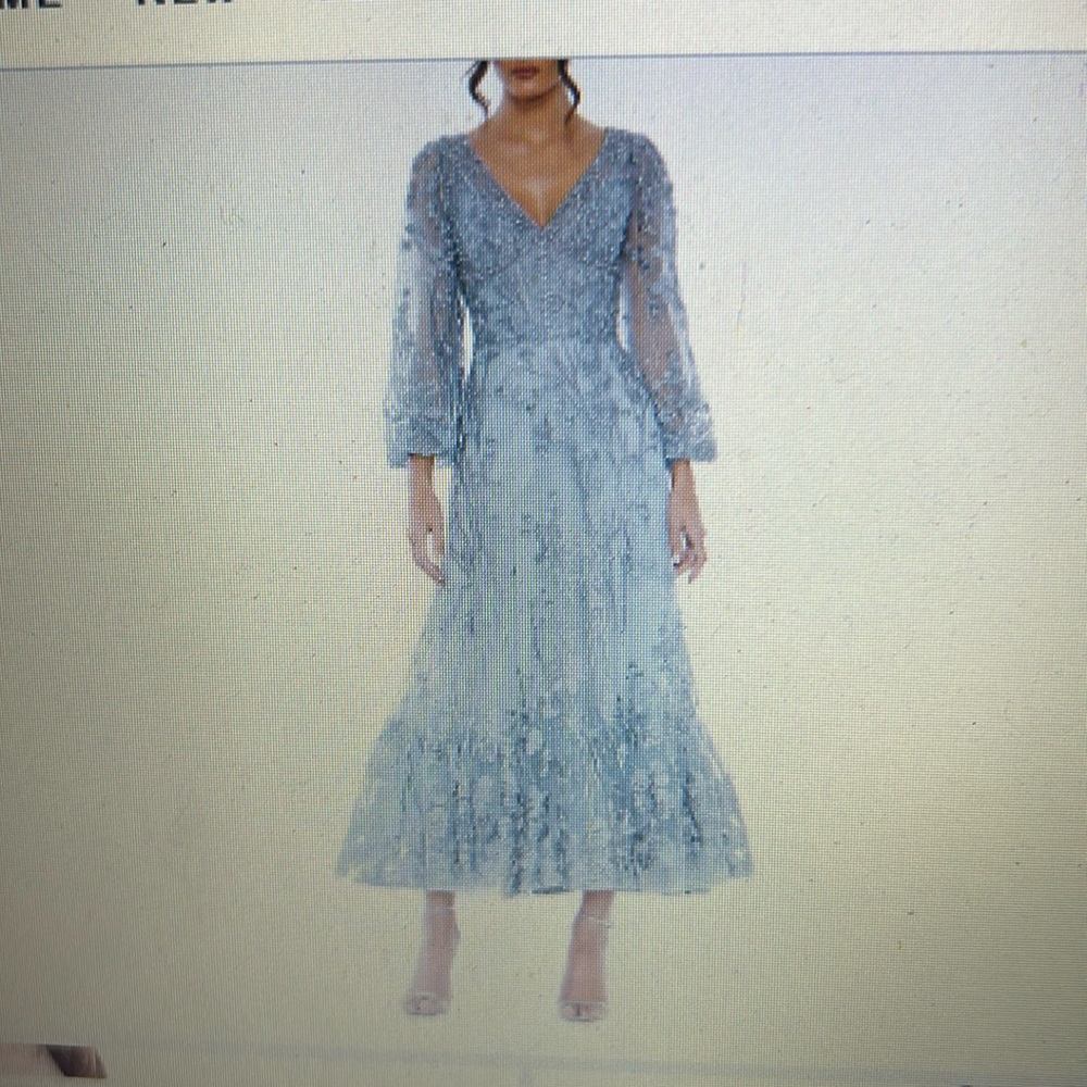 Brand new Mac Duggal dress. Seafoam bluish green, long sleeves.